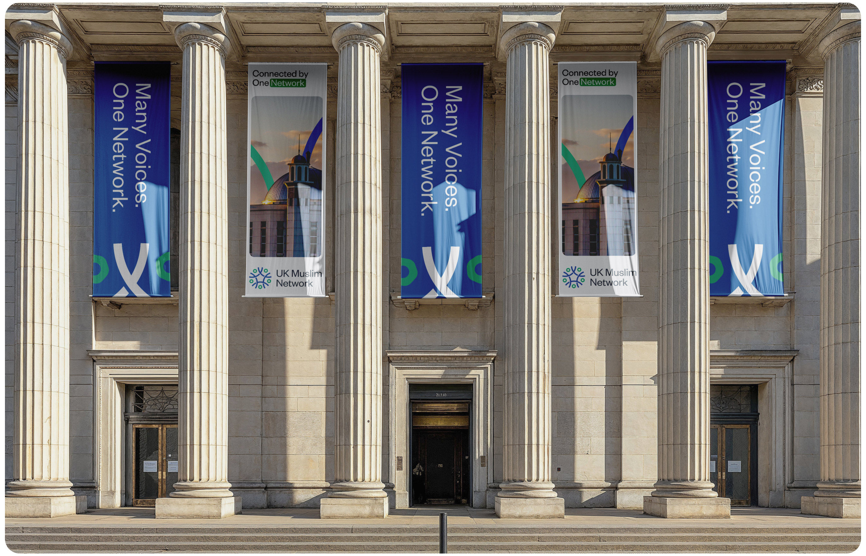 UK Muslim Network building banners across a civic facade